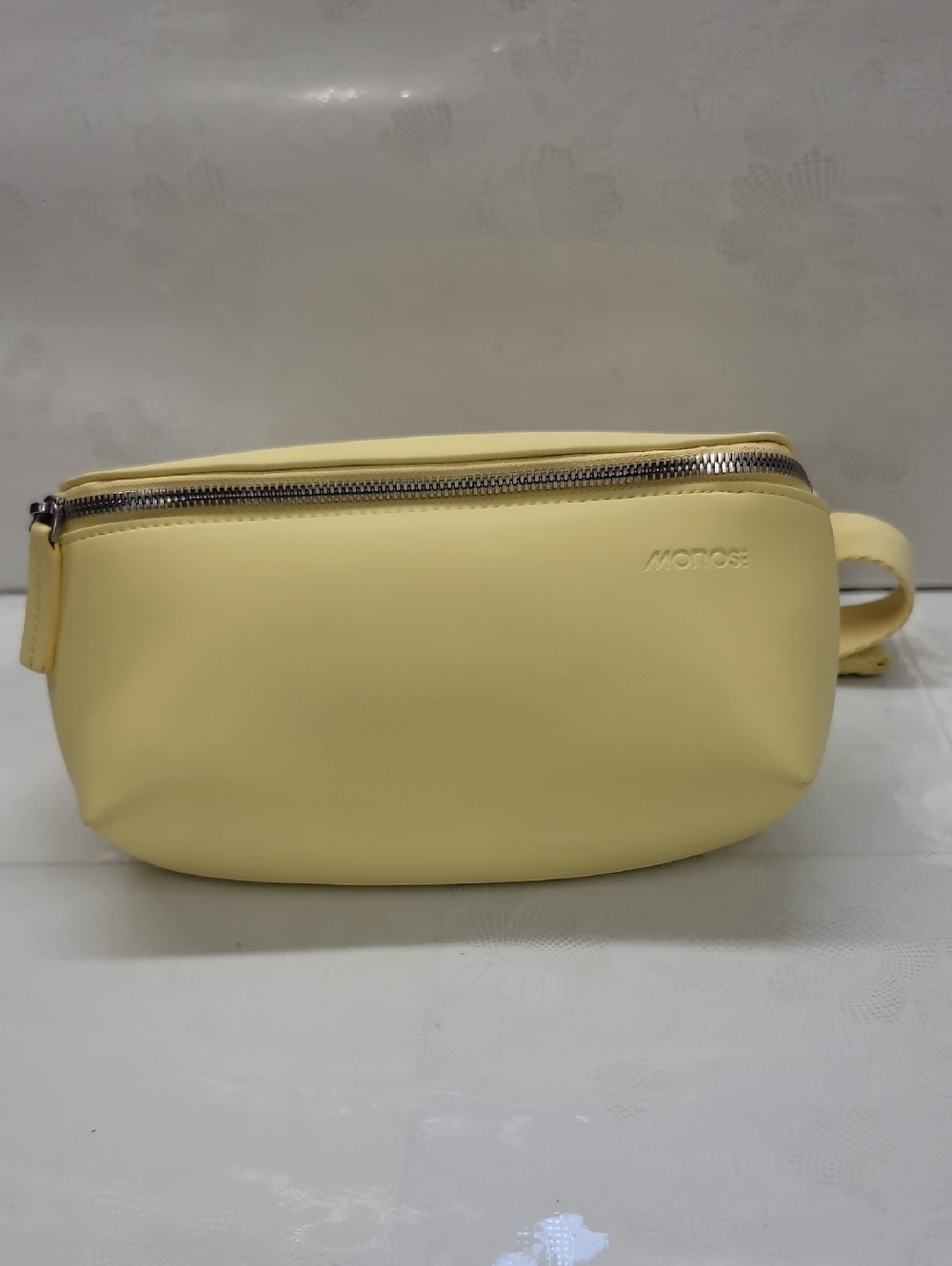 Monos x Magnolia Bakery Metro Sling bag in Soft Yellow